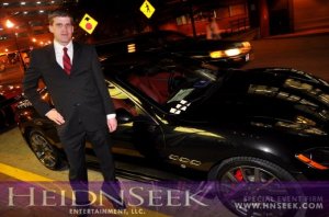 heidnSeek young professional male in suit with Maserati Granturismo at Havana Club in Baltimore, Maryland